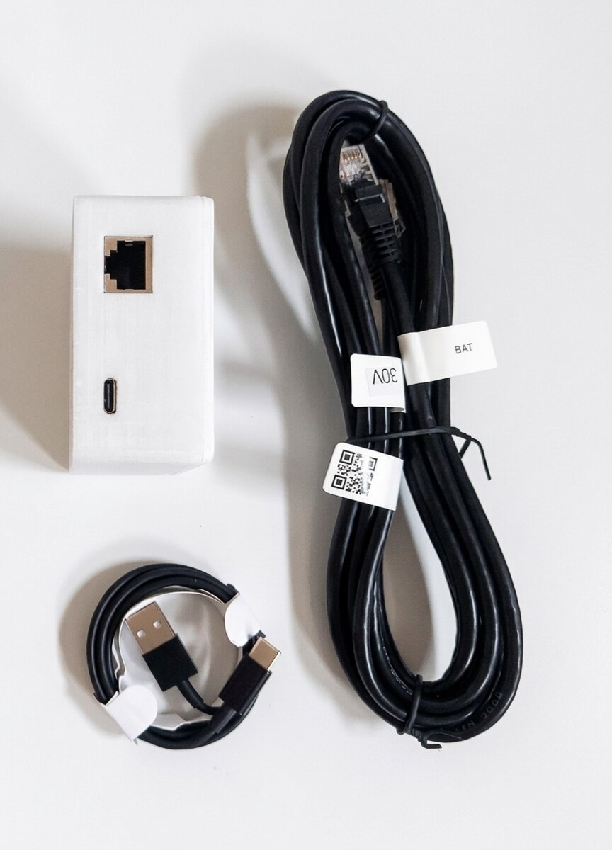 RJ45 console socket and USB-C power socket on the side of the MoniWatt for Pytes box